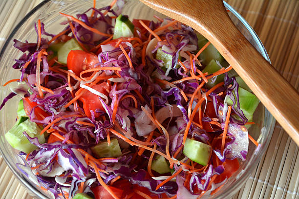 istock Healthy vegetable salad with red red cabbage, cucumber,tomatoes 501907904