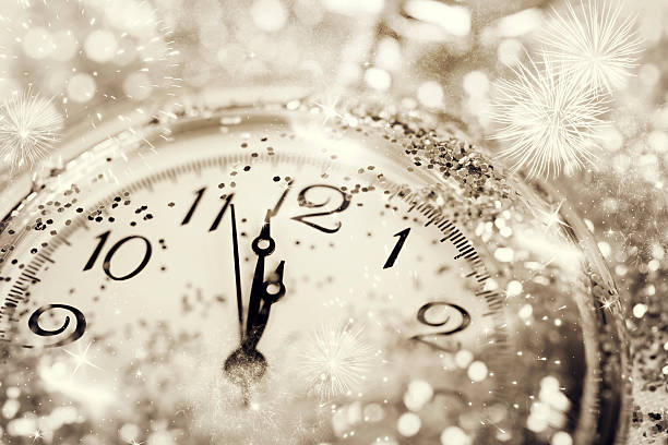 Old watch pointing midnight - New Year concept
