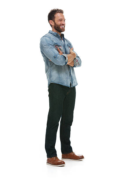 istock Cheerful man standing with arms crossed 501914510