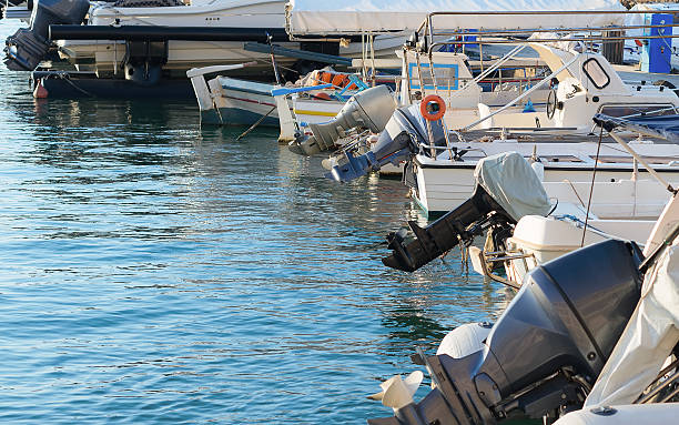 istock Several motor boats moored at the dock. 501915422