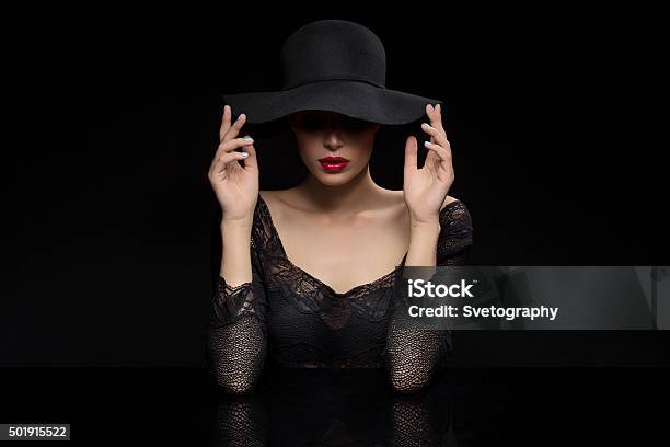 Beautiful Girl With Red Llips In Black Hat Stock Photo - Download Image Now - 2015, Adult, Arts Culture and Entertainment