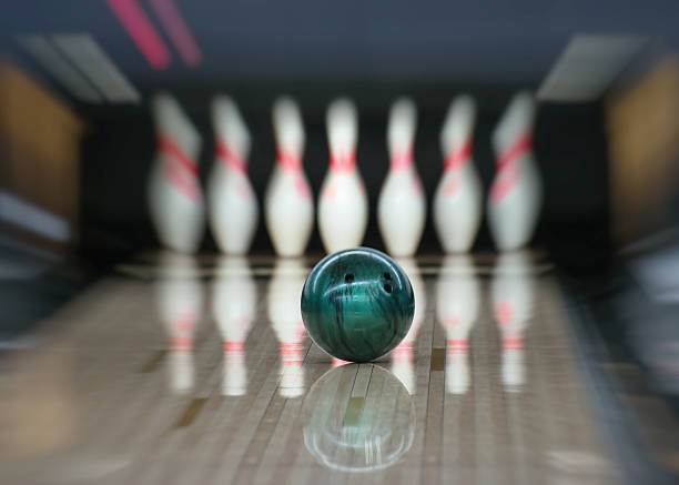 istock Bowling ball going into the pins. Motion blur. 501915922