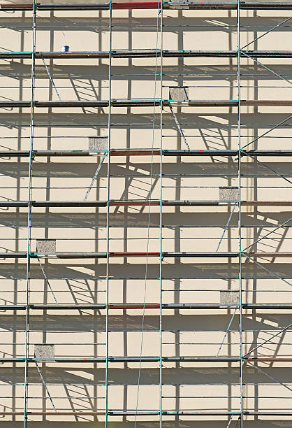 istock Scaffolding in front of house. Facade renovation. 501917296