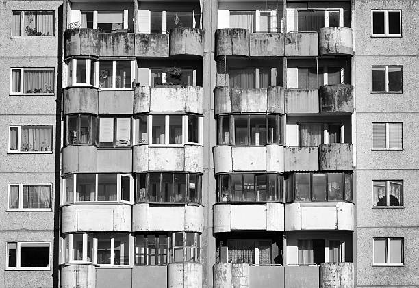 istock Dirty facade with balconies and windows. Black and white. 501917788
