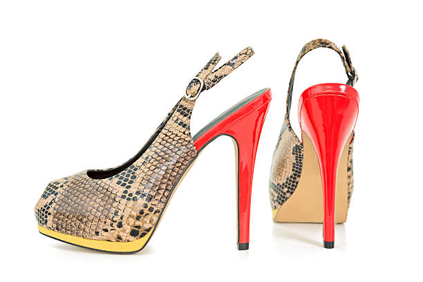 istock Leatheryellow and orange peep toe sling back pumps, isolated 501919440