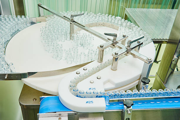 istock machine conveyor with glass bottles ampoules 501932376