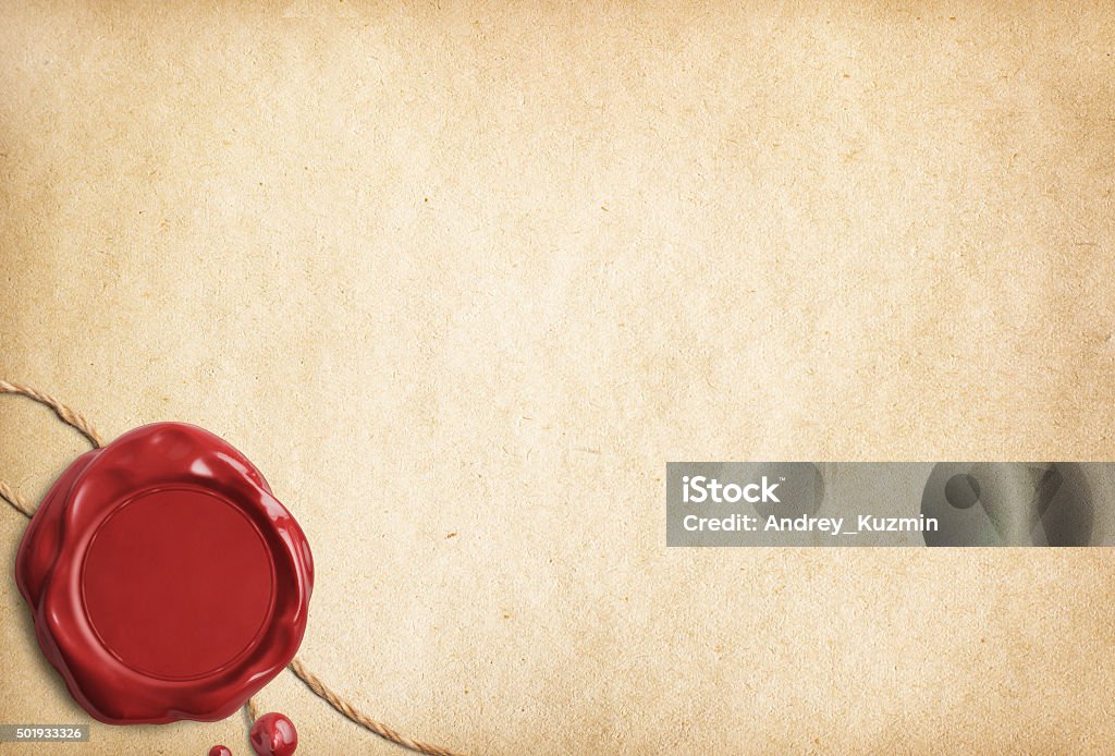 Old parchment paper or letter with red wax seal Old parchment letter with red wax seal 2015 Stock Photo