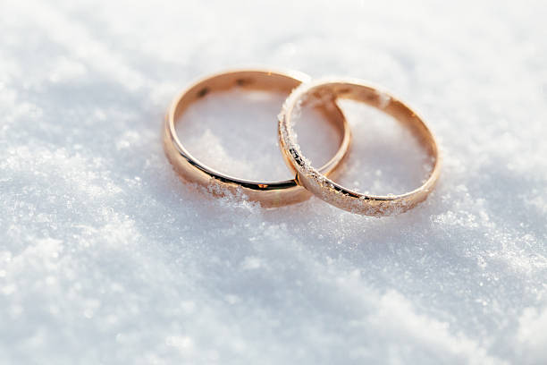 two rings in snow stock photo