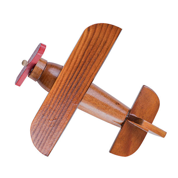 Wooden airplane model top view isolated with clipping path included