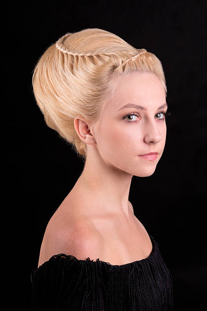 istock Styling women's hair in a cocoon bun 501938360