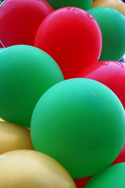 istock Yellow, green and red balloons 501938622