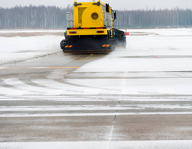istock Snowplow working at airport 501941132