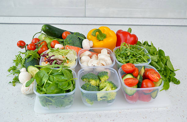 istock Colorful vegetables in plastic bowls 501944112