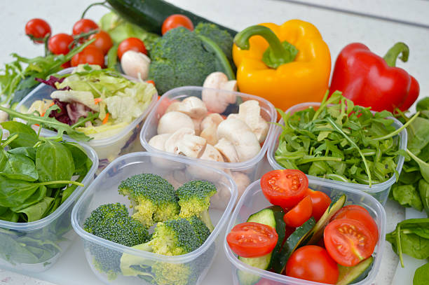 istock Colorful vegetables in plastic bowls 501944756