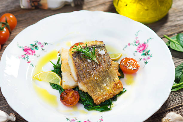 istock Sea bass fillet with spinach 501945022
