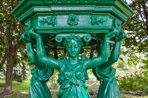 Montreal, Canada - June 14, 2015:  Close-up of 'Fontaine Wallace' - 1871 by Charles-Auguste Lebourg 1829-1906 - cast iron - Parc Jean-Drapeau - île Notre-Dame.