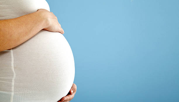 istock Pregnant Woman With Hands On Belly 501946457