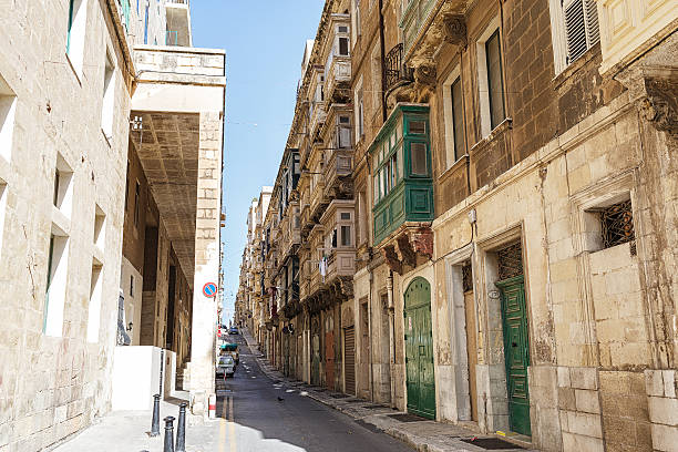 istock Narrow empty street on a sunny day 501946789