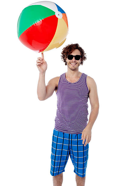 istock Man spinning a ball on his finger 501947151