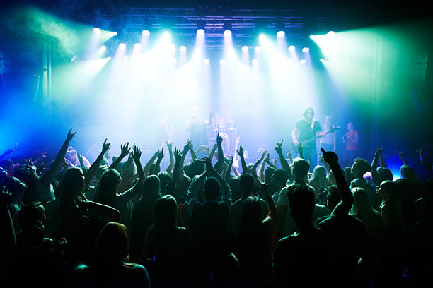 istock Rocking out to their favourite band 501951285