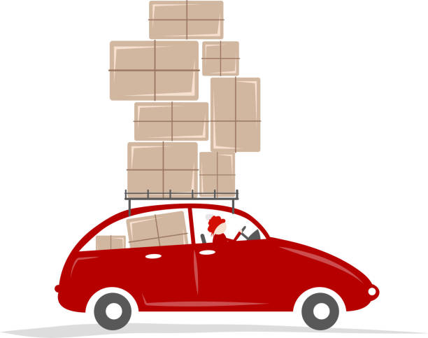 istock Man driving red car with boxes on the roof rack 501951653