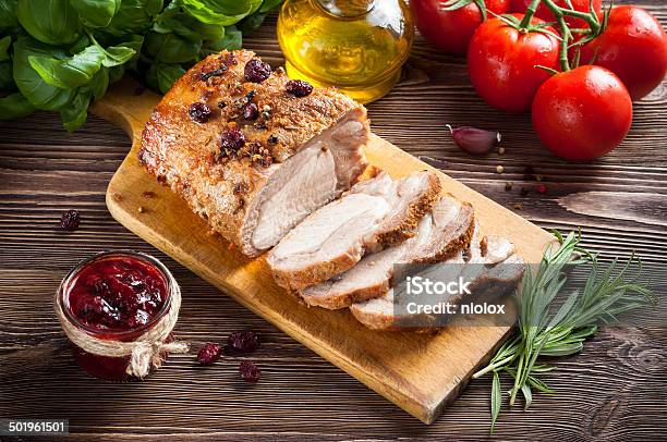 Roasted Pork Loin With Cranberry And Rosemary Stock Photo - Download Image Now - Baked, Basil, Braised