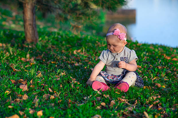 Little girl in autumn Park stock photo