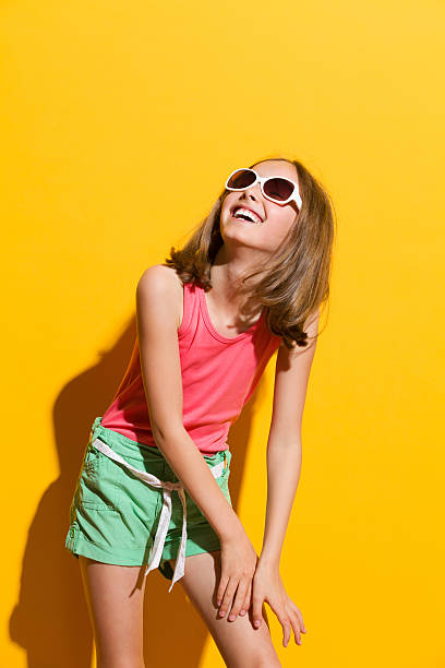 istock Laughing girl in sunlight 501963571