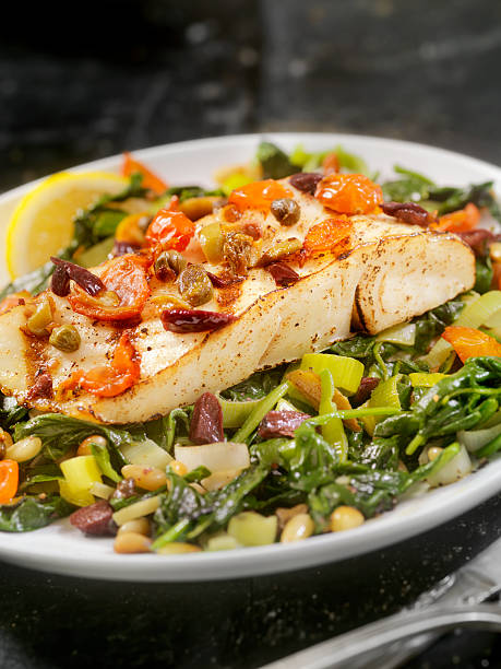 istock Grilled Halibut with Capers,Olives and Tomatoes 501963892