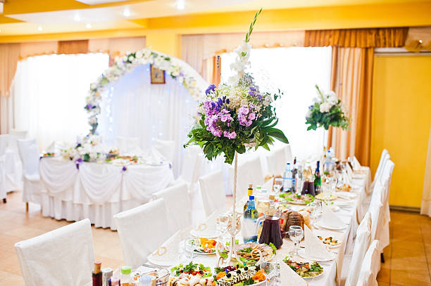 istock Violet lilac flowers on wedding table 501963924