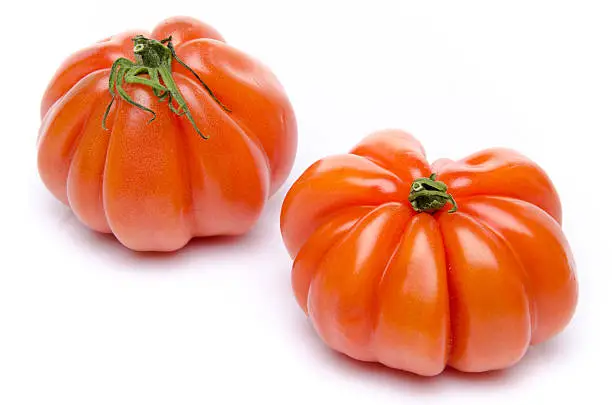 Beefsteak tomatoes, isolated on white
