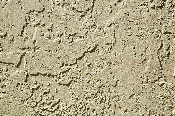 istock painted stucco wall abstract background in sunshine 501965357