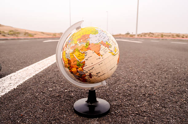 istock Globe Earth on an Asphalt Street 501966032