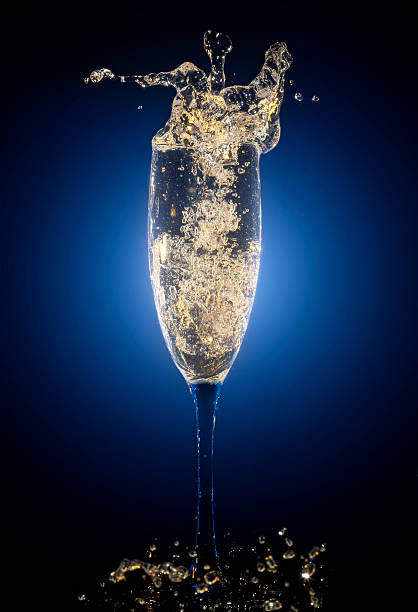 Glass of champagne with splashes