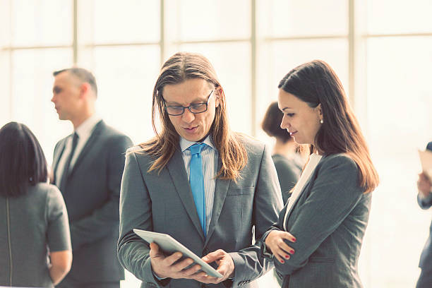 istock Business people discussing in the lobby 501969684