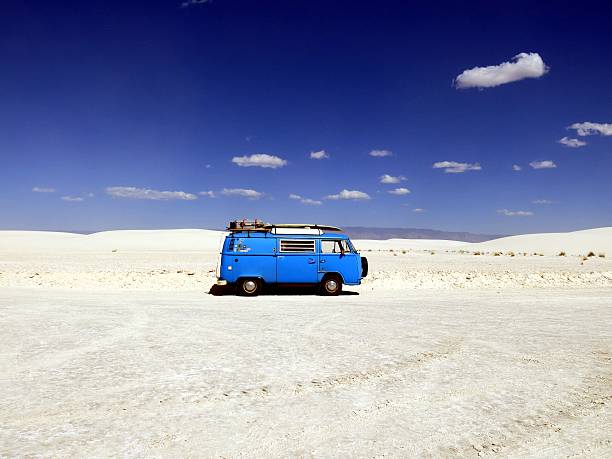 White Sands National Monument, USA - December 15,2015: A blue VW bus parked in the gypsum fields of White Sands National Monument, New Mexico, USA