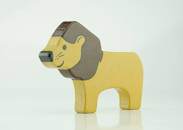 istock Wooden Lion Three Quarter on White 501971908