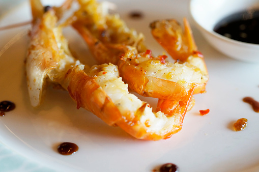 The delicious Thai style baked river prawns with dipping sauce.