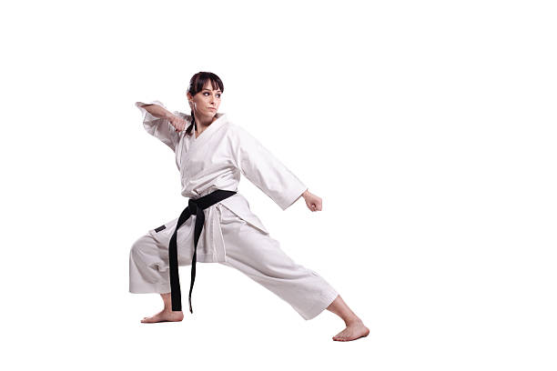 karate dziewczyna uruchamianie - kung fu zdjęcia i obrazy z banku zdjęć