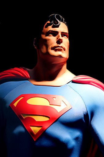 Vancouver, Canada - October 12, 2015: An action figure model of Superman, against a black background.