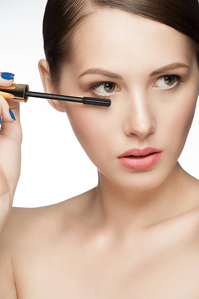 istock Woman applying mascara 501998207