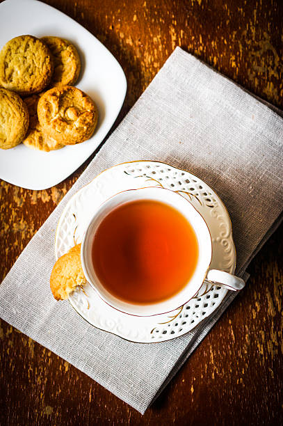 istock Tea with cookies on wooden background 501998325