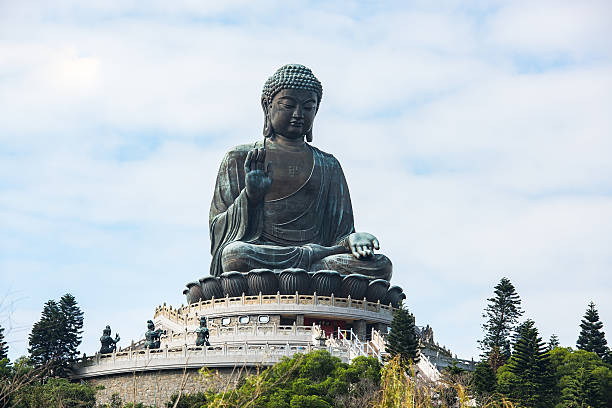 Giant Buddha Hongkong Tian Tan Buddha, also known as the Big Buddha, is a large bronze statue of Buddha Shakyamuni, completed in 1993, and located at Ngong Ping, Lantau Island, in Hong Kong.  monastery religion spirituality river stock pictures, royalty-free photos & images