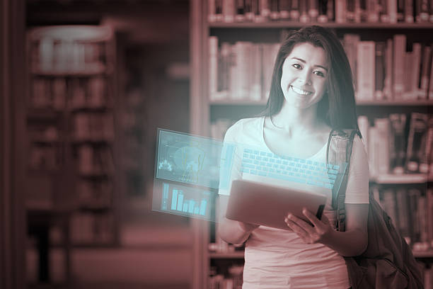 istock Happy cute student working on her futuristic tablet pc 501998837