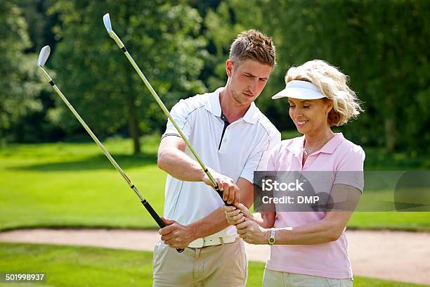 Learning Proper Grip From The Pro Stock Photo - Download Image Now - Golf, Learning, Education Training Class