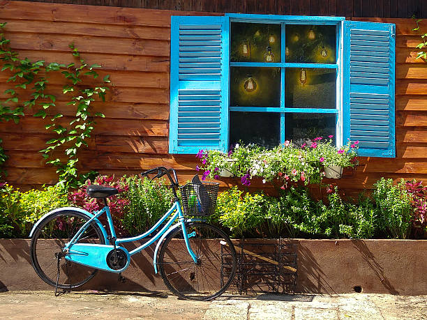 istock vintage theme with bike side the blue window 501999528