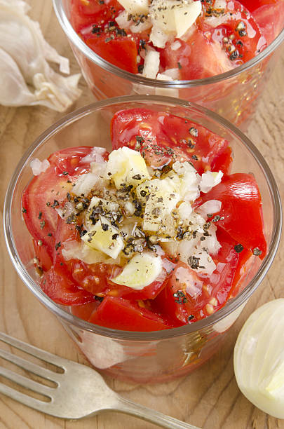 istock tomato salad in a glass bowl 501999977