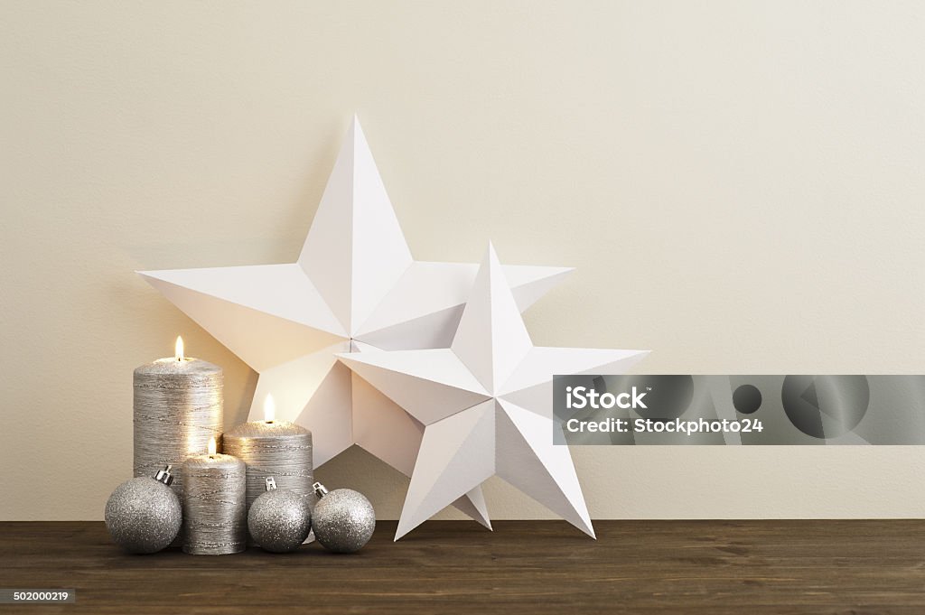 Two stars with silver candles Two stars with silver candles Christmas baubles Advent Stock Photo