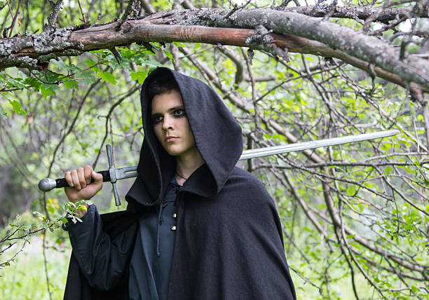 istock Portrait of a beautiful young warrior holding sword 502000222