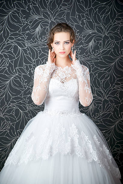 istock Beautiful woman in white wedding dress 502000587